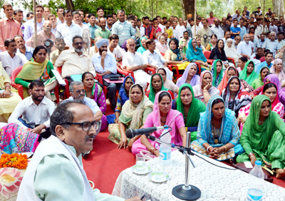 Deputy Chief Minister Dr Nirmal Singh addressing Public Grievance Camp at Billawar on Friday. Deputy Chief Minister Dr Nirmal Singh addressing Public Grievance Camp at Billawar on Friday.