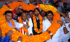 Senior Congress leaders welcoming former BJP MLA, Prof Gharu Ram, into Congress party. Senior Congress leaders welcoming former BJP MLA, Prof Gharu Ram, into Congress party.