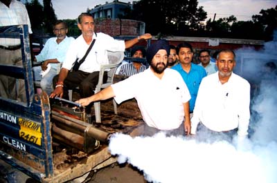 JMC Commissioner Dr Manmohan Singh starting thermal fogging in City on Thursday. JMC Commissioner Dr Manmohan Singh starting thermal fogging in City on Thursday.