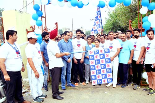 DC Jammu, Simrandeep Singh, flagging off walkathon from Dushhera Ground, Gandhi Nagar in Jammu. DC Jammu, Simrandeep Singh, flagging off walkathon from Dushhera Ground, Gandhi Nagar in Jammu.