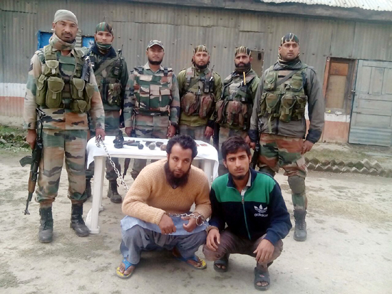Two militants of Jaish-e-Mohammad module, who were arrested in Baramulla. Two militants of Jaish-e-Mohammad module, who were arrested in Baramulla.