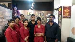 A team of experts of Shades - the salon, posing during a workshop. A team of experts of Shades - the salon, posing during a workshop.