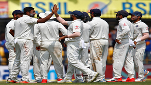 Ravichandran Ashwin celebrates with teammates after the wicket of Ross Taylor on the third day of 3rd and last test match against New Zealand at Holkar Cricket Stadium in Indore on Monday. Ravichandran Ashwin celebrates with teammates after the wicket of Ross Taylor on the third day of 3rd and last test match against New Zealand at Holkar Cricket Stadium in Indore on Monday.