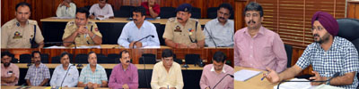 Deputy Commissioner Simrandeep Singh chairing a meeting at Jammu on Tuesday. Deputy Commissioner Simrandeep Singh chairing a meeting at Jammu on Tuesday.