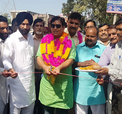 MLA R S Pura, Dr Gagan Bhagat inaugurating a road in R S Pura on Friday. MLA R S Pura, Dr Gagan Bhagat inaugurating a road in R S Pura on Friday.