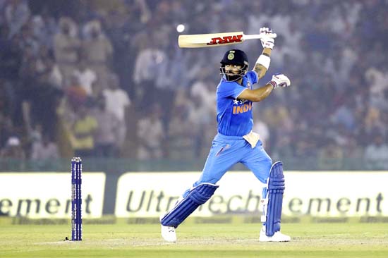 India’s Virat Kohli plays a one-handed shot behind the wicket during third ODI match against New Zealand at Mohali on Sunday.. India’s Virat Kohli plays a one-handed shot behind the wicket during third ODI match against New Zealand at Mohali on Sunday..