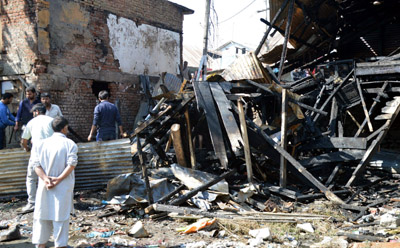 Gutted shops at Qamarwari area of Srinagar. —Excelsior/Shakeel Gutted shops at Qamarwari area of Srinagar. —Excelsior/Shakeel