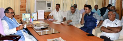 Deputy Chief Minister Dr Nirmal Singh chairing a meeting at Srinagar on Tuesday. Deputy Chief Minister Dr Nirmal Singh chairing a meeting at Srinagar on Tuesday.