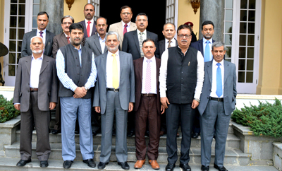 Outgoing Chairman of JK Bank Mushtaq Ahmad posing for photograph with top officers of the bank during farewell function. Outgoing Chairman of JK Bank Mushtaq Ahmad posing for photograph with top officers of the bank during farewell function.