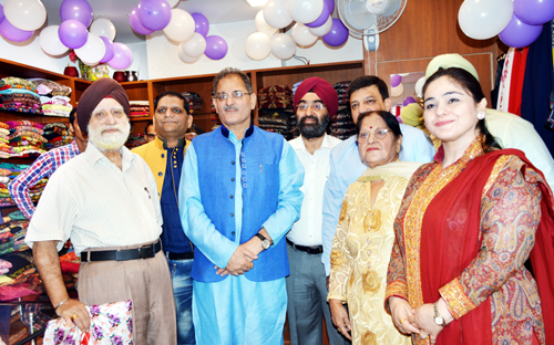 Speaker Legislative Assembly, Kavinder Gupta posing with others after inaugurating a designer store for women at Gole Market in Jammu. -Excelsior/ Rakesh Speaker Legislative Assembly, Kavinder Gupta posing with others after inaugurating a designer store for women at Gole Market in Jammu. -Excelsior/ Rakesh
