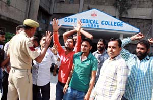 Daily wagers of Medical Department protesting at GMC Hospital in Jammu on Monday. -Excelsior/Rakesh Daily wagers of Medical Department protesting at GMC Hospital in Jammu on Monday. -Excelsior/Rakesh