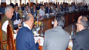 Minister for R&B Abdul Rehman Veeri chairing a meeting at Srinagar on Thursday. Minister for R&B Abdul Rehman Veeri chairing a meeting at Srinagar on Thursday.