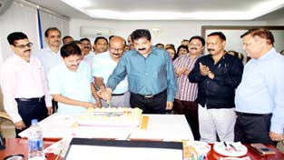 Chairman of the Citizens' Coop Bank, Dinesh Gupta along with BODs and staff, cutting cake to mark 38th Foundation Day of the bank in Jammu on Monday. Chairman of the Citizens' Coop Bank, Dinesh Gupta along with BODs and staff, cutting cake to mark 38th Foundation Day of the bank in Jammu on Monday.