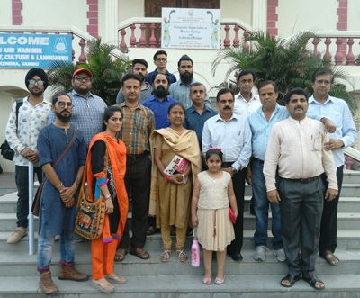 Artists posing for photograph with IT Commissioner, Sangeeta Gupta after inauguration of painting exhibition at Kala Kendra in Jammu. Artists posing for photograph with IT Commissioner, Sangeeta Gupta after inauguration of painting exhibition at Kala Kendra in Jammu.