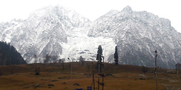 Sonamarg hills received season’s first snowfall in Kashmir valley on Monday. -Excelsior/Shakeel Sonamarg hills received season’s first snowfall in Kashmir valley on Monday. -Excelsior/Shakeel