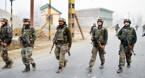 Security forces in action during encounter with militants at Kakapora in Pulwama district on Saturday. -Excelsior/ Younis Khaliq Security forces in action during encounter with militants at Kakapora in Pulwama district on Saturday. -Excelsior/ Younis Khaliq