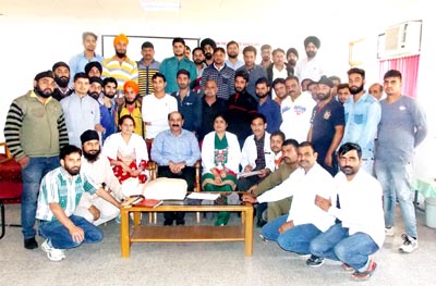 Participants of first-aid training camp posing with Red Cross officials and trainers at Red Cross Bhawan, Kachi Chawni in Jammu. Participants of first-aid training camp posing with Red Cross officials and trainers at Red Cross Bhawan, Kachi Chawni in Jammu.