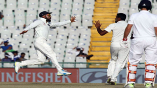 Virat Kohli celebrating dismissal of England batsman with Ravichandran Ashwin during India-England Test Match at Mohali on Monday. Virat Kohli celebrating dismissal of England batsman with Ravichandran Ashwin during India-England Test Match at Mohali on Monday.