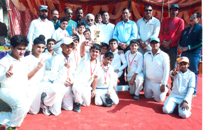 Budding cricketers posing alongwith former Minister, Ajay Sadhotra, Working Committee Member JKCA Ankush Abrol and SP Ranjit Singh at MGCA in Jammu. Budding cricketers posing alongwith former Minister, Ajay Sadhotra, Working Committee Member JKCA Ankush Abrol and SP Ranjit Singh at MGCA in Jammu.