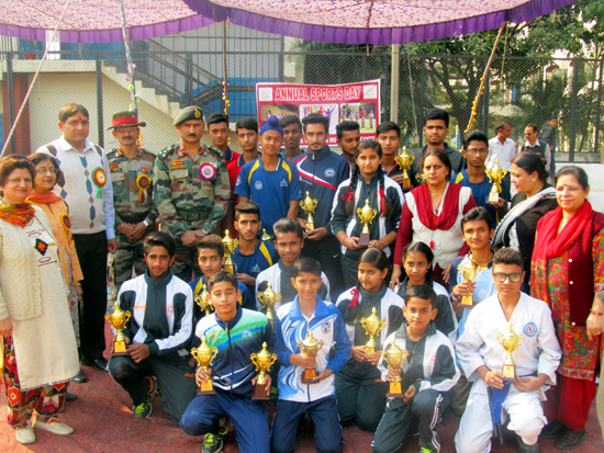 Winners posing for a group photograph alongwith the dignitaries during Annual Sports Day at KV-2 in Jammu. Winners posing for a group photograph alongwith the dignitaries during Annual Sports Day at KV-2 in Jammu.