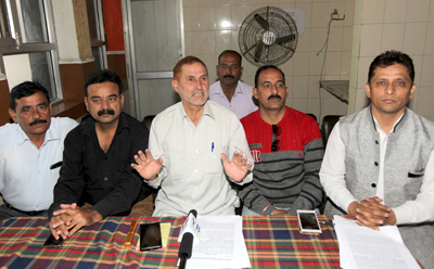 NTUF president Mohd Gafoor Dar addressing press conference in Jammu on Sunday. —Excelsior/ Rakesh NTUF president Mohd Gafoor Dar addressing press conference in Jammu on Sunday. —Excelsior/ Rakesh