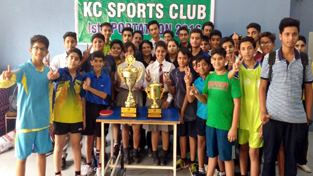 Winners posing for a group photograph at KC Sports Club in Jammu on Thursday. Winners posing for a group photograph at KC Sports Club in Jammu on Thursday.