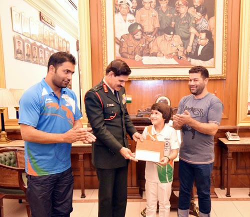 Chief of Army Staff, General Dalbir Singh felicitating Miss Tajamul Islam, winner of the Gold Medal in World Sub Junior Kickboxking Championship, in New Delhi on Wednesday. Chief of Army Staff, General Dalbir Singh felicitating Miss Tajamul Islam, winner of the Gold Medal in World Sub Junior Kickboxking Championship, in New Delhi on Wednesday.