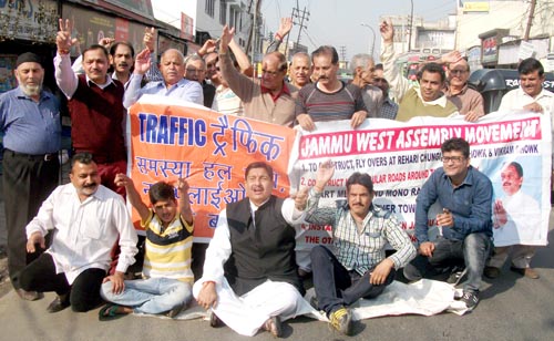 Sunil Dimple, president, Jammu West Assembly Movement and others raising slogans in support of their demands on Wednesday. Sunil Dimple, president, Jammu West Assembly Movement and others raising slogans in support of their demands on Wednesday.