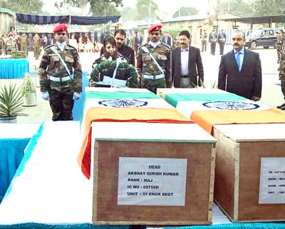 Chief Minister, Mehbooba Mufti laying wreath on mortal remains of martyrs on Wednesday. Chief Minister, Mehbooba Mufti laying wreath on mortal remains of martyrs on Wednesday.