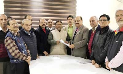 A deputation of retired employees of J&K Industries Limited and MLA Sat Sharma during meeting at Jammu. A deputation of retired employees of J&K Industries Limited and MLA Sat Sharma during meeting at Jammu.