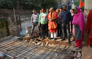State BJP vice president, Yudhvir Sethi reviewing construction work in the complex of Radha Krishna Rook-Mani temple, Pacci Dhakki in Jammu. State BJP vice president, Yudhvir Sethi reviewing construction work in the complex of Radha Krishna Rook-Mani temple, Pacci Dhakki in Jammu.