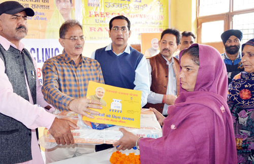 Speaker Legislative Assembly, Kavinder Gutpa distributing LPG connection to a beneficiary at Jammu on Wednesday. Speaker Legislative Assembly, Kavinder Gutpa distributing LPG connection to a beneficiary at Jammu on Wednesday.