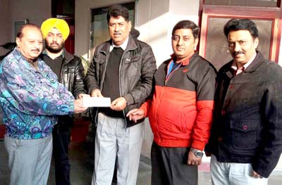 SKUAST-J Non-Teaching Employees Association presenting a cheque for financial help to one of its members. SKUAST-J Non-Teaching Employees Association presenting a cheque for financial help to one of its members.
