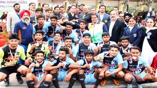 Jubilant players of Punjab U-19 Football team receiving Trophy from Minister of State for Sports and Transport, Sunil Kumar Sharma and other dignitaries in Jammu on Saturday. -Excelsior/Rakesh Jubilant players of Punjab U-19 Football team receiving Trophy from Minister of State for Sports and Transport, Sunil Kumar Sharma and other dignitaries in Jammu on Saturday. -Excelsior/Rakesh