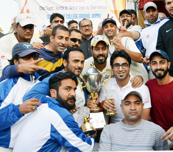 Jubilant VCC players posing alongwith DyCM and other dignitaries after clinching title at GGM Science College ground in Jammu. Jubilant VCC players posing alongwith DyCM and other dignitaries after clinching title at GGM Science College ground in Jammu.