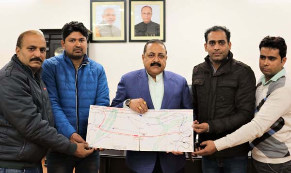 Union Minister Dr Jitendra Singh receiving a Railway line plan prepared by a group of young technocrats representing Union Minister Dr Jitendra Singh receiving a Railway line plan prepared by a group of young technocrats representing