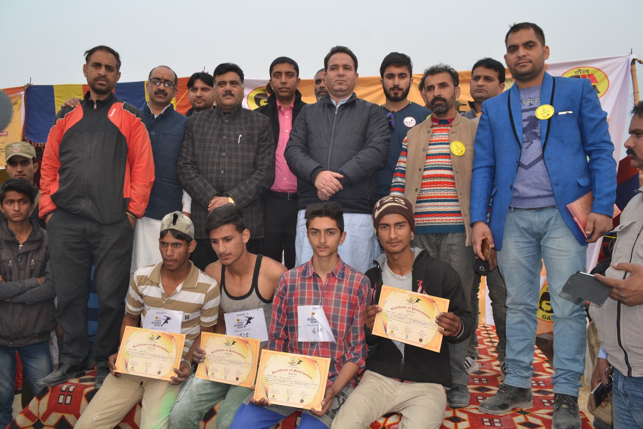 Minister of State for Sports and Transport, Sunil Sharma posing with qualifying athletes at Chowgan ground, Kishtwar on Monday. Minister of State for Sports and Transport, Sunil Sharma posing with qualifying athletes at Chowgan ground, Kishtwar on Monday.