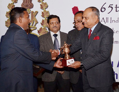DGP K Rajendra presenting trophy to one of the participants of Hockey Championship during cultural evening in Jammu on Monday. DGP K Rajendra presenting trophy to one of the participants of Hockey Championship during cultural evening in Jammu on Monday.