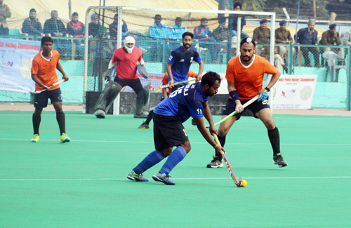 Players in action during a match at K K Hakhu Hockey Stadium in Jammu. -Excelsior/Rakesh Players in action during a match at K K Hakhu Hockey Stadium in Jammu. -Excelsior/Rakesh