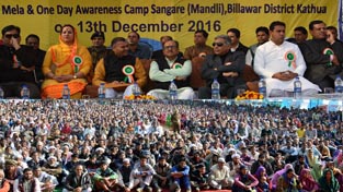 Deputy Chief Minister Dr Nirmal Singh and others during a public meeting at Sangare Mandi in Billawar on Tuesday. Deputy Chief Minister Dr Nirmal Singh and others during a public meeting at Sangare Mandi in Billawar on Tuesday.