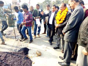 MLA Samba Dr DK Manyal starting macadamization work of road. MLA Samba Dr DK Manyal starting macadamization work of road.