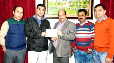 SKUAST-TAJ handing over a cheque to Dean Agriculture. SKUAST-TAJ handing over a cheque to Dean Agriculture.