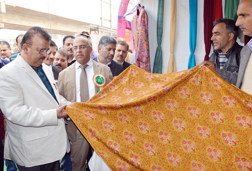 Industries Minister C P Ganga inspecting stall of exhibition on Saturday. Industries Minister C P Ganga inspecting stall of exhibition on Saturday.