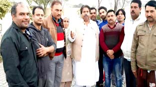 Senior Cong leader Raman Bhalla talking to former Panchayat members at Bhour Camp in Jammu on Tuesday. Senior Cong leader Raman Bhalla talking to former Panchayat members at Bhour Camp in Jammu on Tuesday.