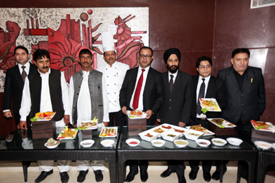 General Manager, Hotel K C Residency, Rahul Jandial, along with other officials and chefs showcasing Kashmiri cuisine at ‘The Terrace Skylounge’. General Manager, Hotel K C Residency, Rahul Jandial, along with other officials and chefs showcasing Kashmiri cuisine at ‘The Terrace Skylounge’.
