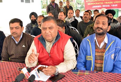 PDPTU leader Suresh Sharma and JKTDC Employees Union leader Lal Singh addressing joint press conference at TRC in Jammu on Saturday. -Excelsior/ Rakesh PDPTU leader Suresh Sharma and JKTDC Employees Union leader Lal Singh addressing joint press conference at TRC in Jammu on Saturday. -Excelsior/ Rakesh