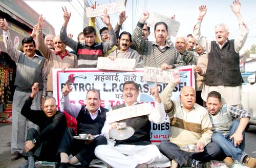 Sunil Dimple, president, Jammu West Assembly Movement and others raising slogans in support of their demands on Friday. Sunil Dimple, president, Jammu West Assembly Movement and others raising slogans in support of their demands on Friday.