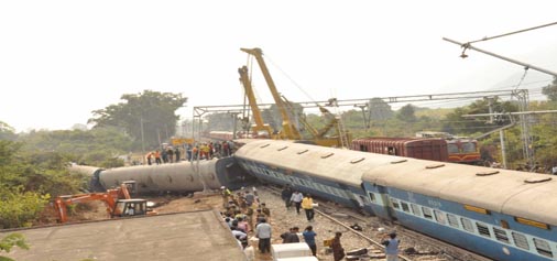 Mangled remains of coaches of the ill-fated Jagadalpur-Bhubaneswar Express train which derailed at Kuneru Railway Station in Kumarada Mandal in Vizianagaram district of Andhra Pradesh on Saturday night.(UNI) Mangled remains of coaches of the ill-fated Jagadalpur-Bhubaneswar Express train which derailed at Kuneru Railway Station in Kumarada Mandal in Vizianagaram district of Andhra Pradesh on Saturday night.(UNI)