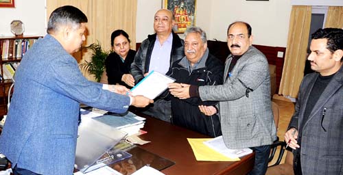 Principal Secretary Raj Bhavan receiving memorandum from ASKPC members. Principal Secretary Raj Bhavan receiving memorandum from ASKPC members.