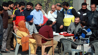 HoD Cardiology Dr Sushil Sharma examining patients at Brij Nagar on Sunday. HoD Cardiology Dr Sushil Sharma examining patients at Brij Nagar on Sunday.